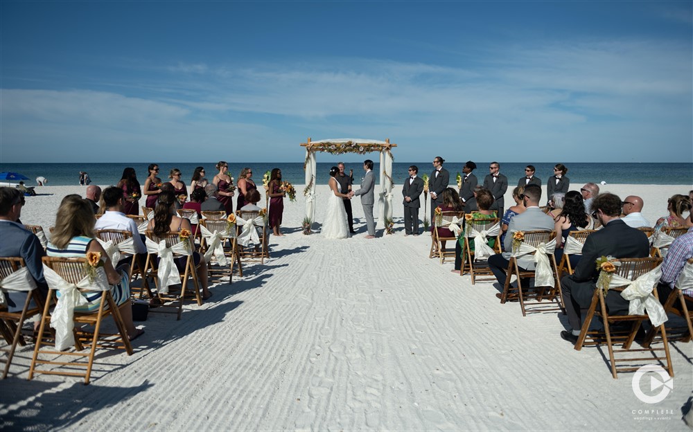 St. Pete beach wedding ceremony photos by Complete Weddings + Events Tampa Bay.