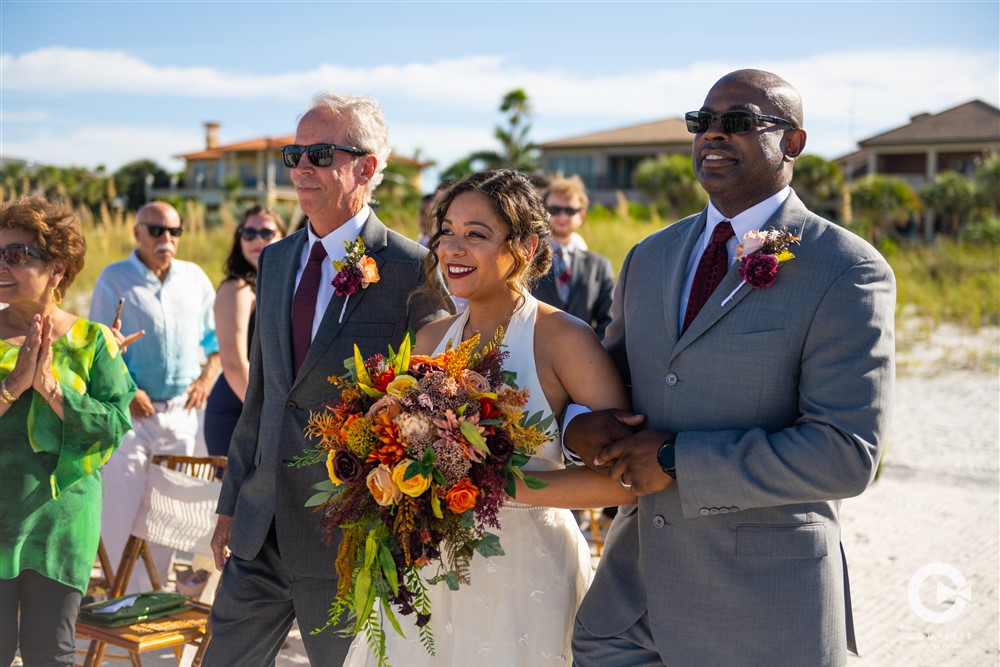 St. Pete beach wedding ceremony photography by Complete Tampa.