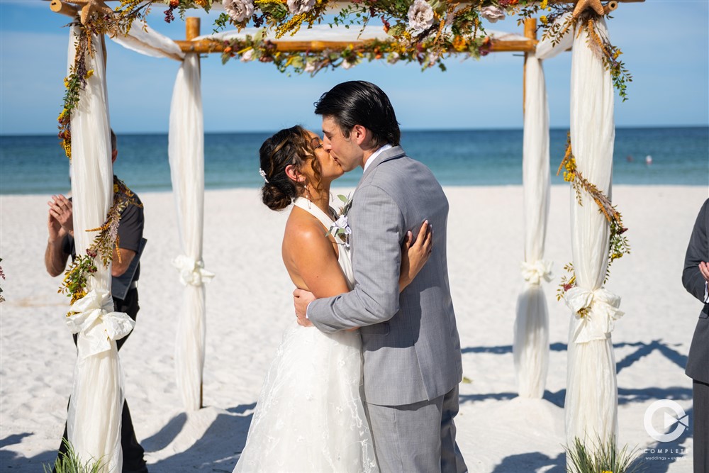 Pass a grille beach wedding ceremony in St. Petersburg, Florida.