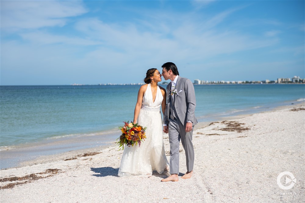 Newlywed beach portraits on pass a grille beach.
