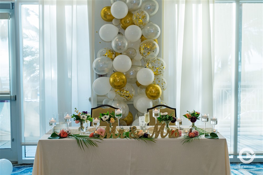 Glam Aloha Hyatt Regency wedding reception decor.